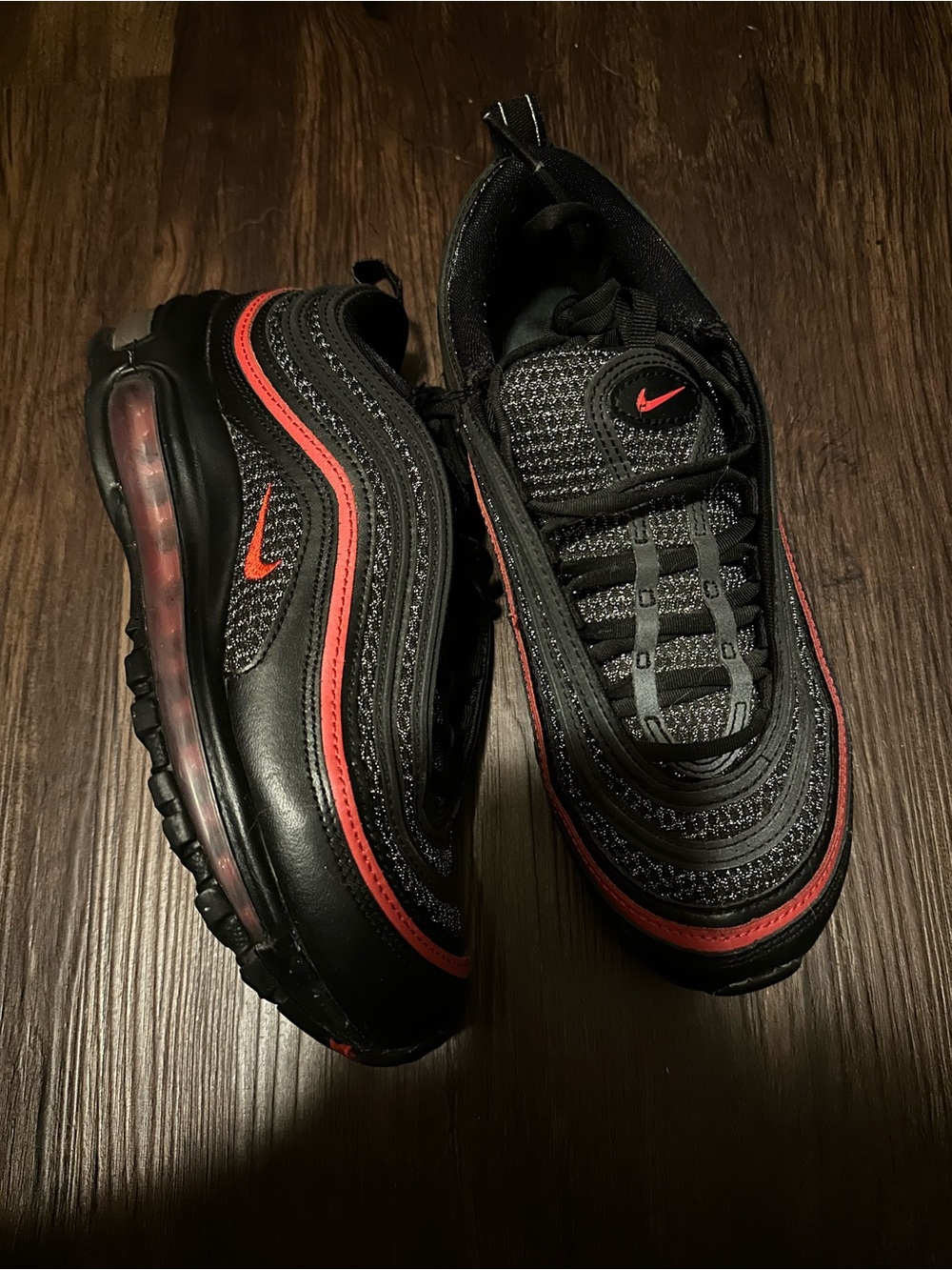 Nike Women’s Black Sneakers with Red Accents